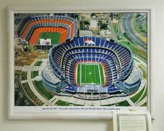 SB-4 ($150) Large photo on canvas print of the two Denver Stadiums just before demolishing the old one.  This is a limited edition, only 100 made.  This one is 15/100 and comes with COA.  Comes framed and measures 44.5"w x 34"h.   A great man cave addition!  Great condition!