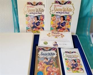 SW7-2 ($30) Deluxe Limited Edition Snow White and the seven Dwarfs gift set.  2 collector VHS movies, set of lithographs to frame and the book.  Open box, but in like new condition.