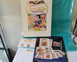 SW7-2 ($30) Deluxe Limited Edition Snow White and the seven Dwarfs gift set.  2 collector VHS movies, set of lithographs to frame and the book.  Open box, but in like new condition.