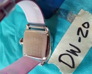 DW-20 ($30) Disney Eeyore watch (new in box).  Clear rubber adjustable band. In Disney tin. 