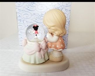 PM-42 ($47) Precious Moments 710036 "Aren't you Sweet".  Shows Minnie Mouse in a snow globe on ice skates.  Comes in original box.  No flaws noted.