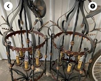 A pair of newer but good quality iron chandeliers 