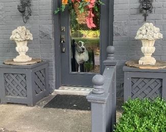 At the front door is a pair of garden baskets, a pair of heavy vintage iron sconces and a French bread basket full of bread, sunflowers and other florals. Notice Marcus at the door waiting to greet each of you at the sale!