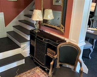 French Empire foyer piece and an antique hand carved French chair covered in black leather 