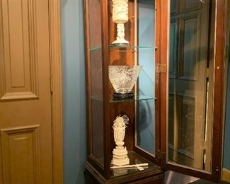 Curio cabinet filled with the best antique carved ivory, antique carved bone and crystal 