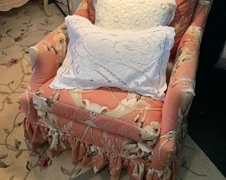 A vintage chair covered in English fabric, this chair and all the drapes will be sold for one price