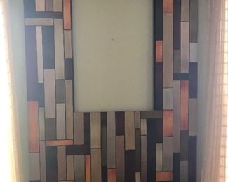 $40 Multi-Colored Metal Abstract Wall Art. Measures: 39 1/2 x 59