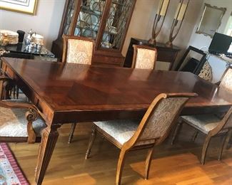 $750 Ethan Allen Dining Table and Chairs, 6 Addison chairs, 2 Leafs and full table pads. Measures 6ft with 2 leaves 2ft. 10 ft long with leaves in.