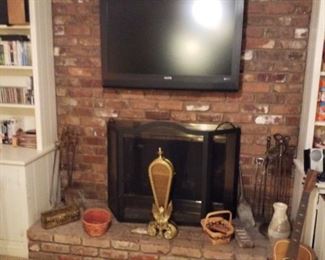 Wall-mount flat screen TV, 2 fireplace sets, fan-style fireplace screen, black fireplace screen, guitar