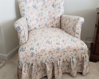 Flowered chair. 26" wide x 28" high x 29" deep. Some fading in fabric color.