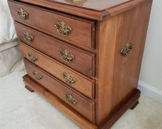 Side table. 23.5" tall x 24" wide x 14" deep. Some fading due to light exposure.