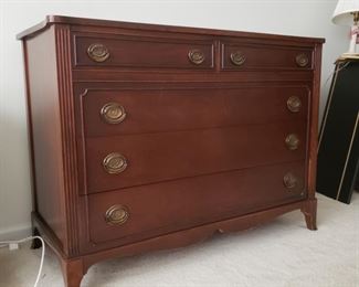 Dresser. 47" wide x 34.5" tall x 21" deep. There is a water damage spot on the top.