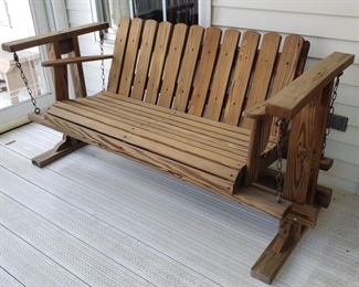 Wooden swing chair. 64" wide x 27" deep x 32" high.