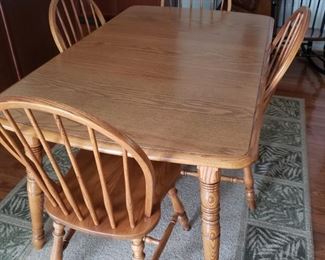 Kitchen table with leaf. 59" long x 36" wide.
