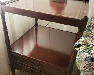 Leather-top side table. 19" wide x 19" deep x 26.5" tall.
