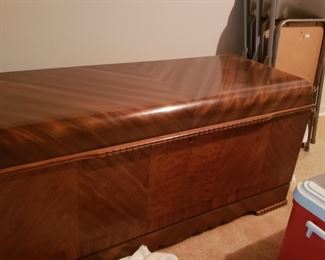 Lane cedar chest. One shelf. 24" high x 47" wide x 18" deep.