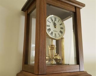 Mantle clock. 8.5" wide x 11.5" tall x 7" deep.