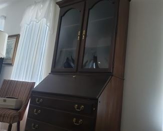 Glass-fronted secretary. 39.5" wide x 21" deep x 81" tall. 34" deep with drop-leaf desk open.