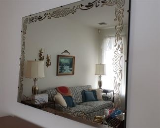36" x 48". There is a place on the upper right-hand corner where the gold fill-in is slipping. Should be able to slide back in place once it is taken off the wall.