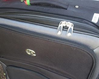 Large black roller bag 18" x 13" x 29"...expandable...by Cassini