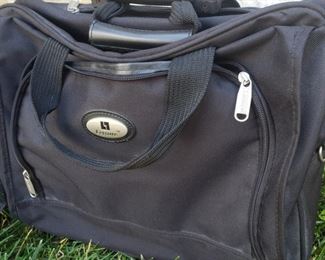 Leisure Brand rolling briefcase with retractable handle. 13" x 17" x 6.5"