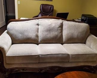 Cream color sofa w carved apron