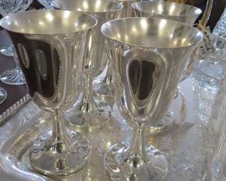 Silver plate water goblets.