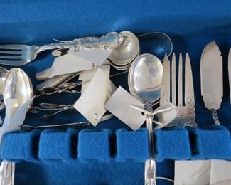 Sterling silver serving pieces.