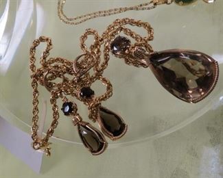Gold filled pendant necklace with pierced earrings.