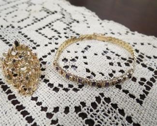 Beautiful solid 14 kt gold ring with diamonds removed weighs 12.3 grams and the lovely bracelet with amethyst gemstones also diamonds removed, weighs 9.8 grams. Very nice pieces, add your own stones.