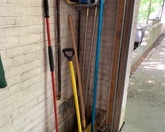 Lot of brooms, etc. - $10