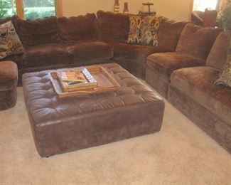 Sectional couch by Thayer Coggin.  Leather Ottoman by Thayer Coggin.