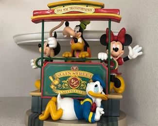 Disney character on a Trolley....stands about 20" tall