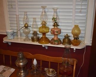 Some of the large Collection of Antique Lanterns in the Webb Estate and a partial view of the Tell City Bench