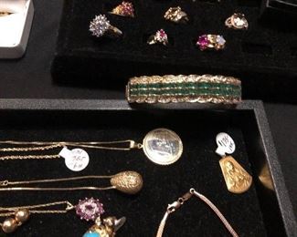 10-18K gold items.  18K Emerald & Diamond Bracelet