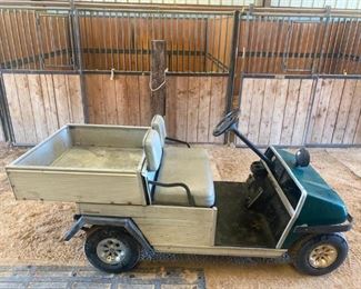 53	

Farm Club Cart with Dump Bed (watch video)
Farm club cart that runs great.  Tires are in good condition and has a back hitch.  The back box is a dump bed.  Has a gasoline engine too.