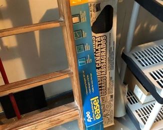 box of gutter guards and easel