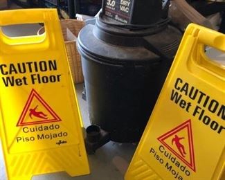 caution signs and wetvac