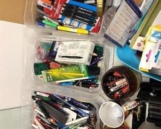 office and school supplies. highlighters, markers, pencils, staplers, hole punches, stickey notes, note pads, rubber bands, envelopes, rulers, files folders, etc