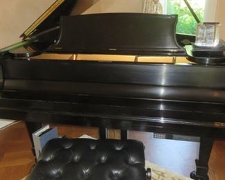1910  Steinway Grand is a traditional style in an ebony case. It fully restored with Player installed.  