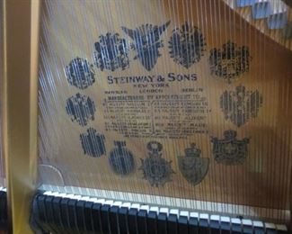 1910  Steinway Grand is a traditional style in an ebony case. It fully restored with Player installed.  