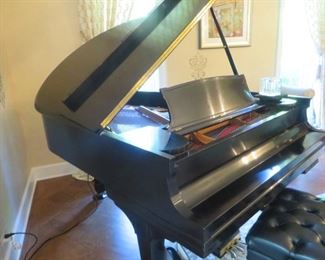 1910  Steinway Grand is a traditional style in an ebony case. It fully restored with Player installed.  