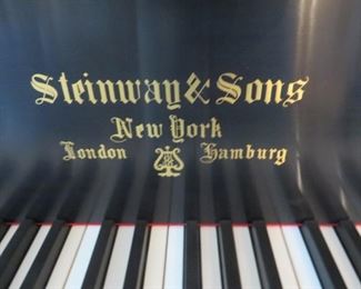 1910  Steinway Grand is a traditional style in an ebony case. It fully restored with Player installed.