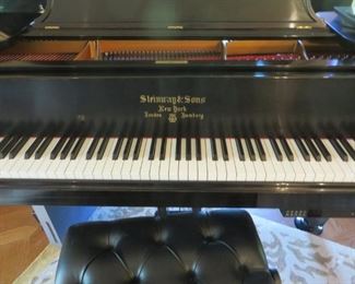 1910  Steinway Grand is a traditional style in an ebony case. It fully restored with Player installed.  
