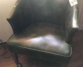Beautiful faux leather chairs with wheels. Ideal for a library, study or game room.
