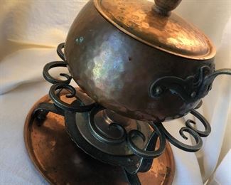 One of Two Hammered Copper Fondue Pots