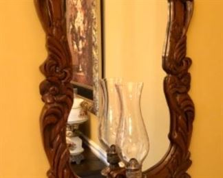 Ornate mirror with shelf