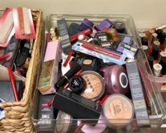 Bunches of unused makeup, nail polish, lotion, powders, hair products