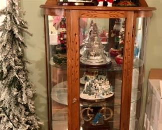 Small bow front curio, Thomas Kinkade musical Christmas trees,  