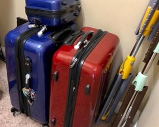 Suitcases, clothes racks